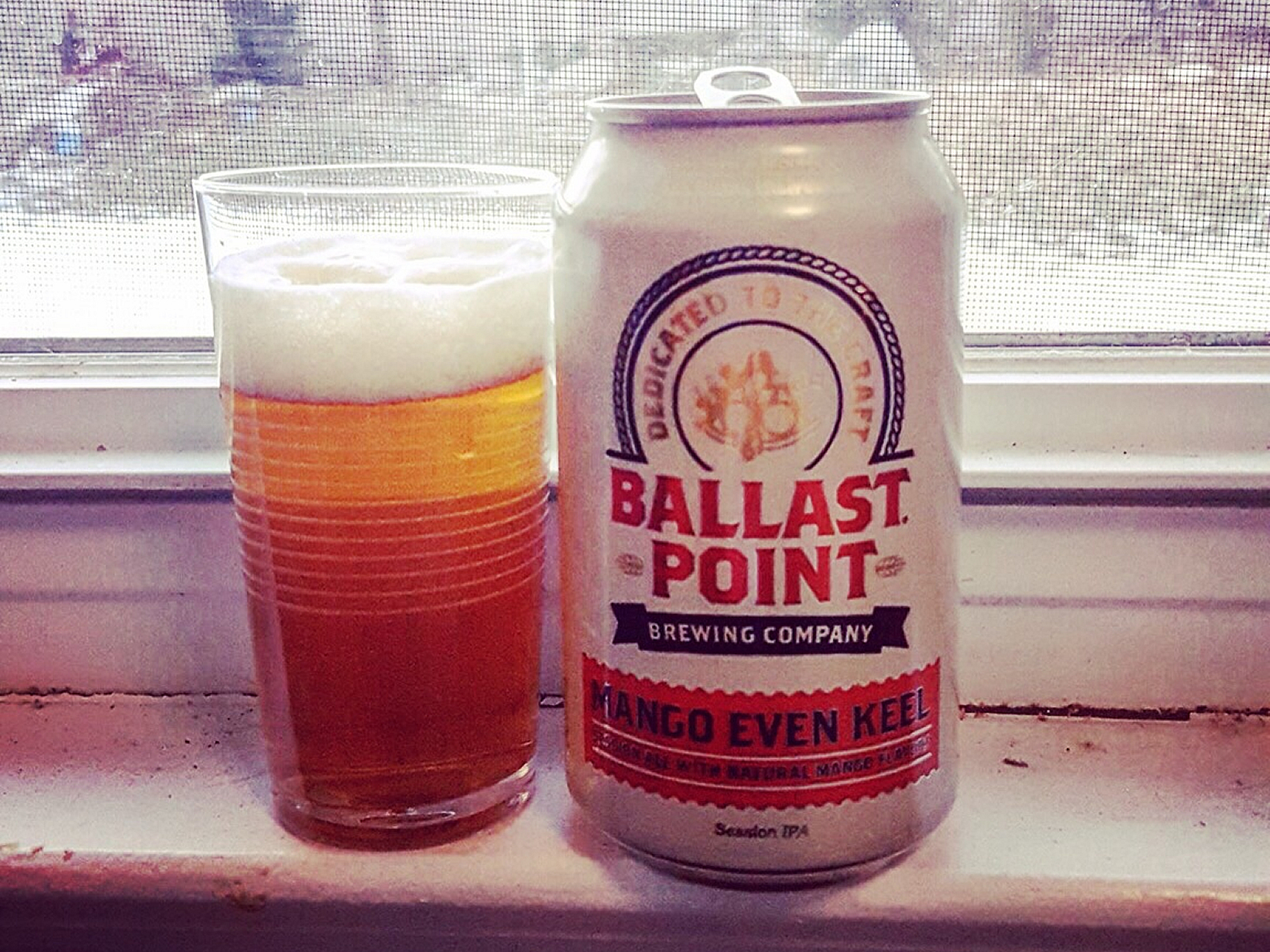 Ballast Point Brewing Company Mango Even Keel Beers on Windowsills