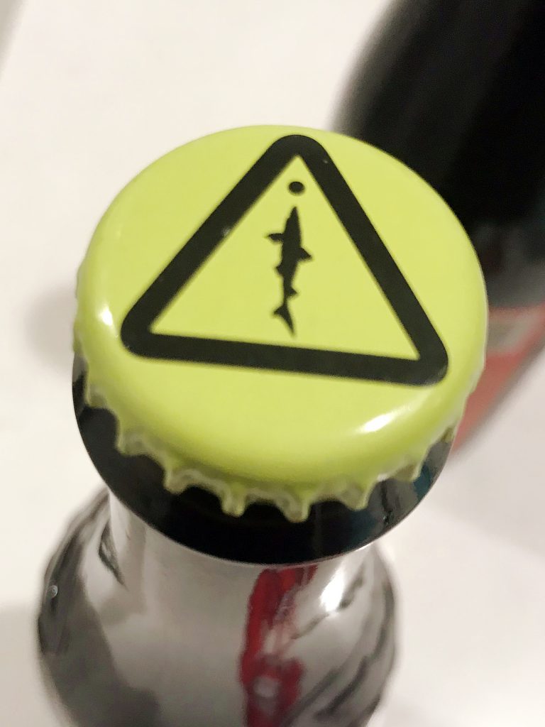 Dogfish Head Craft Brewery's yellow danger cap